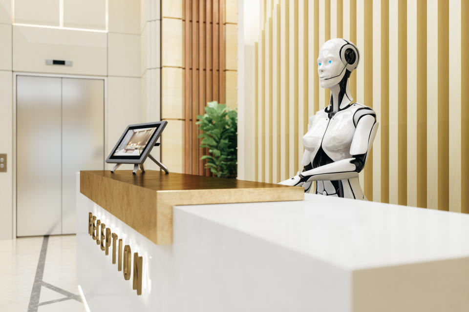Robot assistant on modern hotel / office reception.