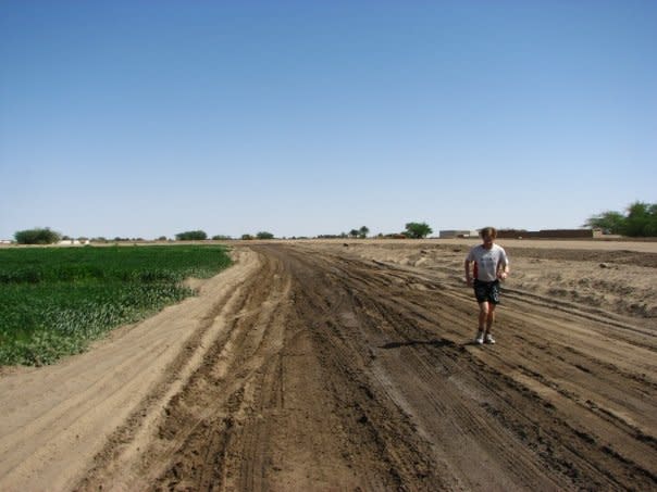 Jesper Kenn Olsen running on a rural road in Mozambique (Jesper Kenn Olsen/PA)
