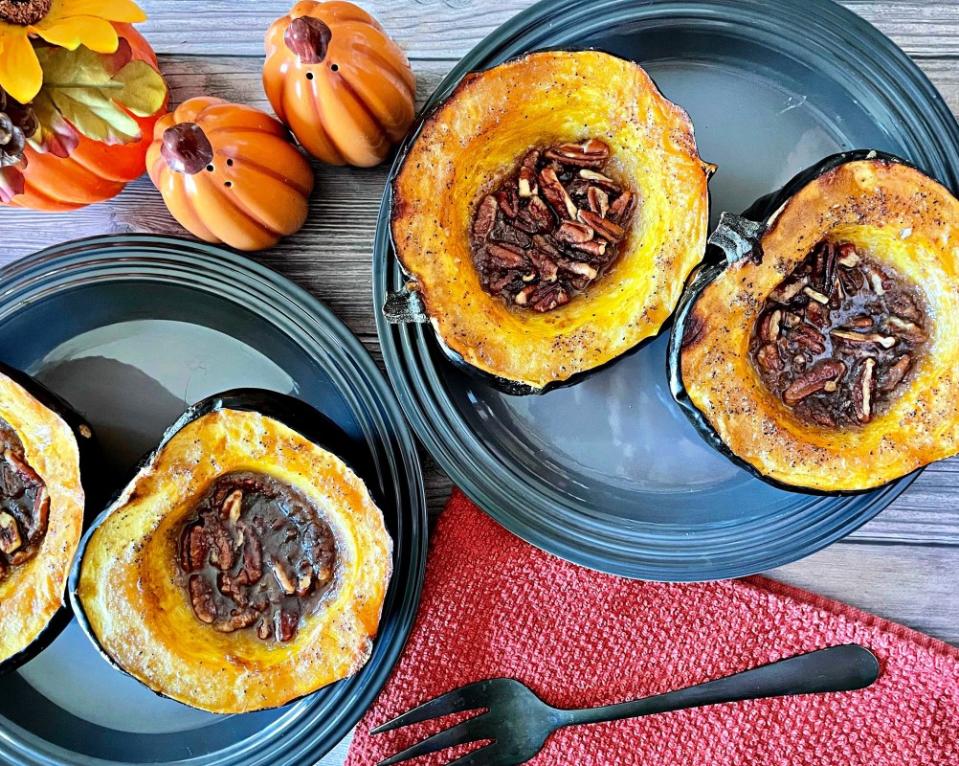 <p>Everyday Mom's Meals</p><p>The warm flavors of pecan pie stuffed into tender, perfectly cooked acorn squash. </p><p><strong>Get the recipe: <a href="https://everydaymomsmeals.blogspot.com/2021/11/happy-thanksgiving-from-emm-family.html" rel="nofollow noopener" target="_blank" data-ylk="slk:Praline Roasted Acorn Squash;elm:context_link;itc:0;sec:content-canvas" class="link ">Praline Roasted Acorn Squash</a></strong></p>