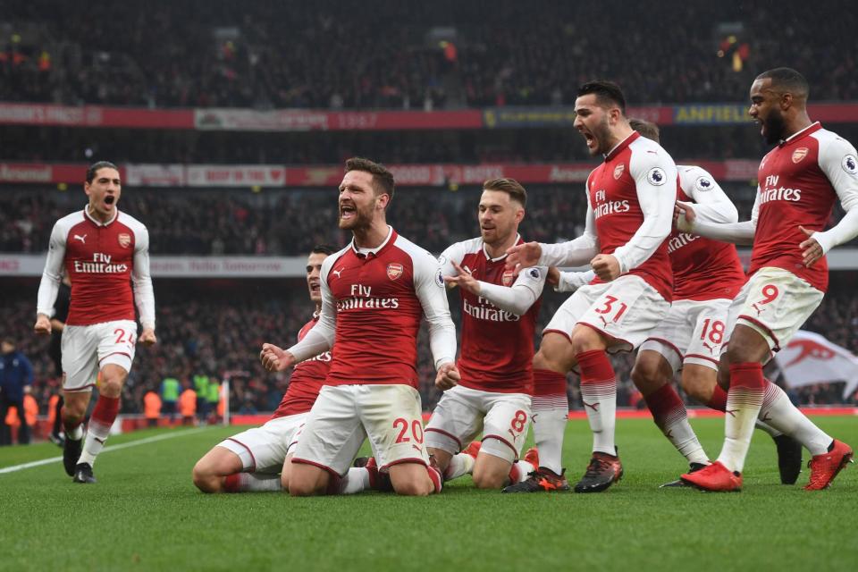 Victory: The Gunners celebrates Shkodran Mustafi's opening goal: Arsenal FC via Getty Images