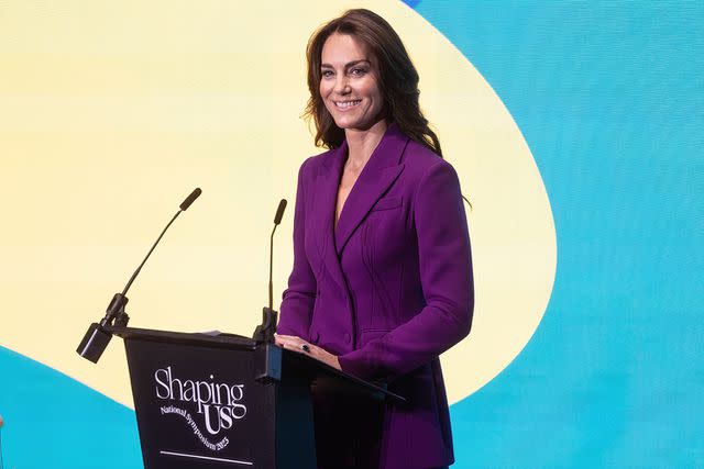 <p>Richard Pohle - WPA Pool/Getty Images</p> Kate Middleton speaks on stage at the Shaping Us National Symposium on November 15.