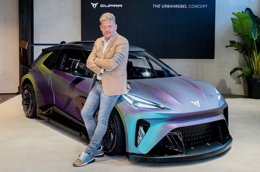 Cupra boss Wayne Griffiths poses with the Urbanrebel concept car