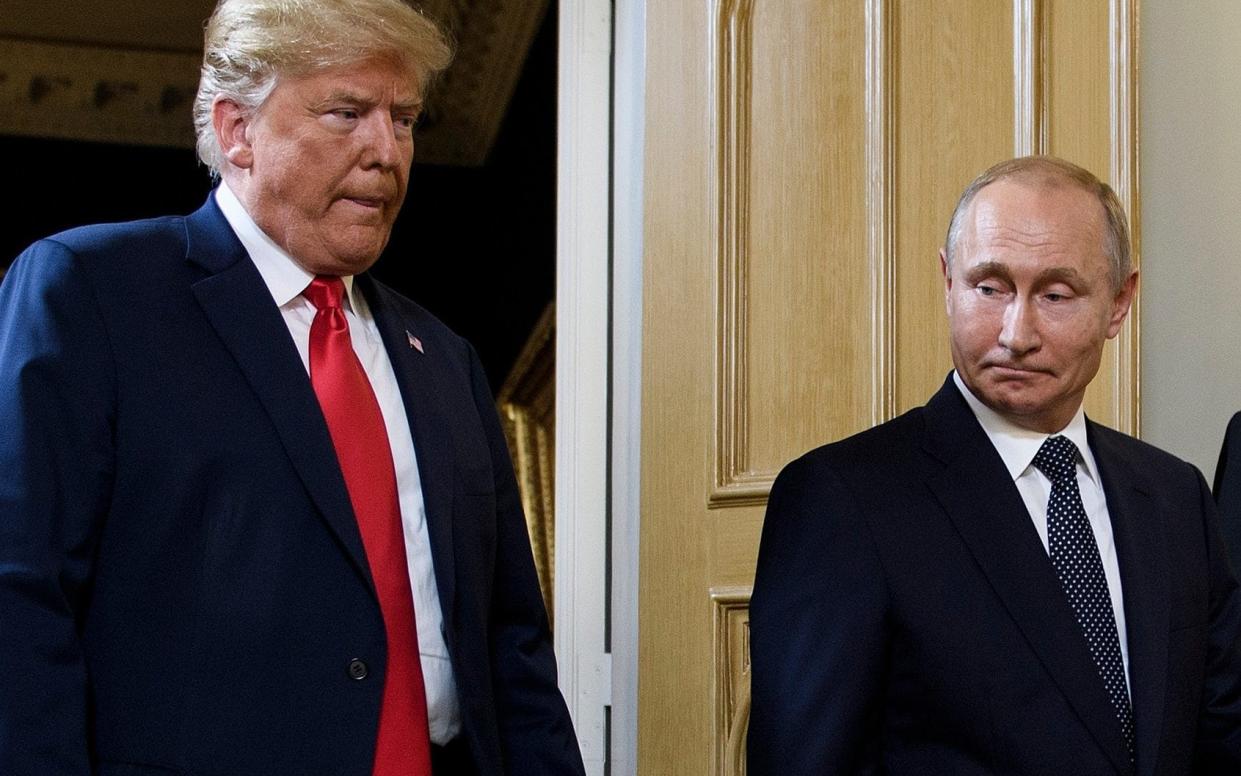 Donald Trump and Vladimir Putin in Helsinki - AFP