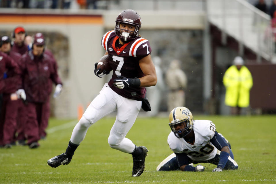 Oct 3, 2015; Blacksburg, VA, USA; Virginia Tech Hokies tight end Bucky Hodges (7) runs the ball after a catch against Pittsburgh Panthers defensive back Dennis Briggs (20) during the second quarter at Lane Stadium. Mandatory Credit: Peter Casey-USA TODAY Sports