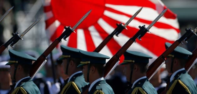 Japan's PM warns China on use of force as jets scrambled