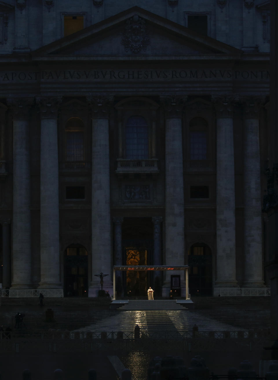 Pope Francis delivers the Urbi and Orbi prayer (Latin for To the City and To the World) in an empty St. Peter's Square, at the Vatican, Friday, March 27, 2020. Praying in a desolately empty St. Peter's Square, Pope Francis on Friday likened the coronavirus pandemic to a storm laying bare illusions that people can be self-sufficient and instead finds "all of us fragile and disoriented" and needing each other's help and comfort. The new coronavirus causes mild or moderate symptoms for most people, but for some, especially older adults and people with existing health problems, it can cause more severe illness or death. (AP Photo/Alessandra Tarantino)