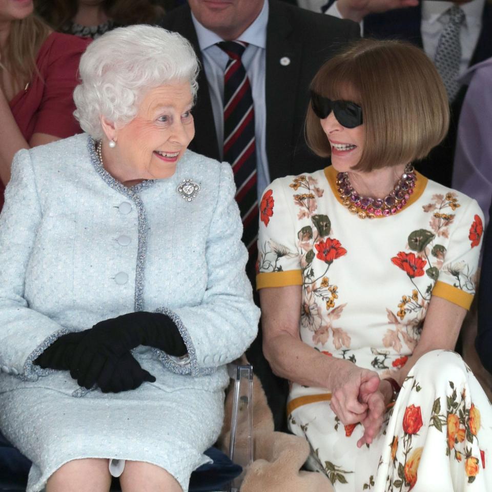 Queen Elizabeth II sits next to Anna Wintour as they view Richard Quinn's runway show at London Fashion Week earlier this week.  - Getty Images Europe