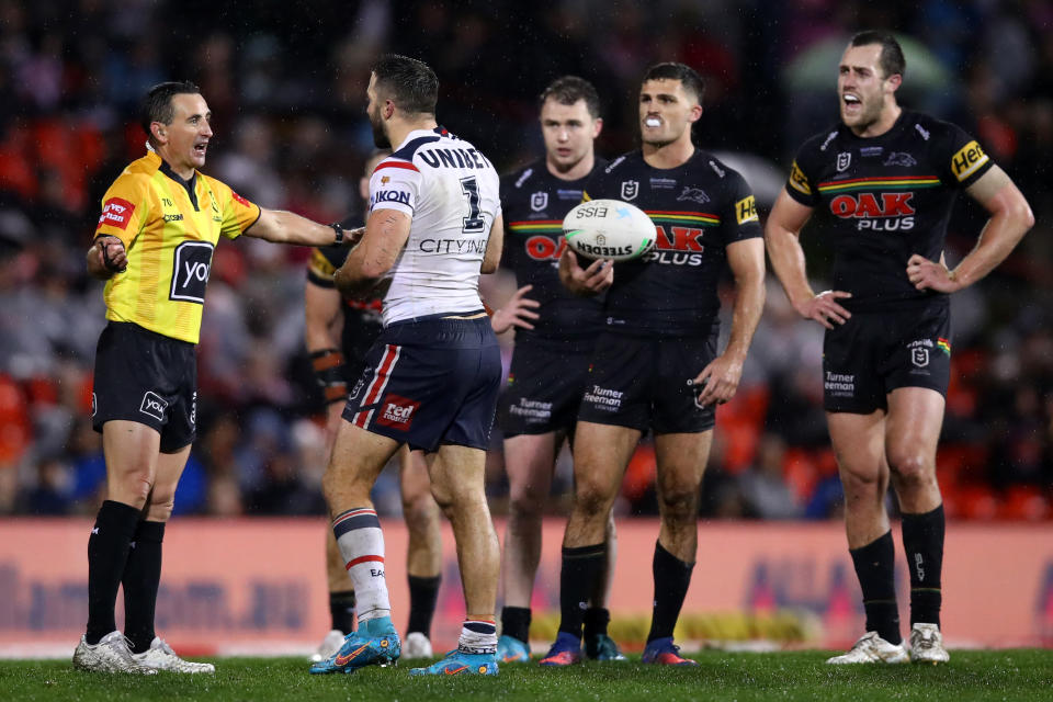 James Tedesco, pictured here speaking to referee Gerard Sutton during the Roosters' loss to Penrith.