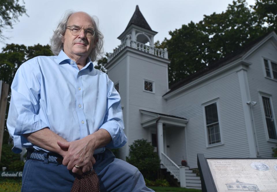 Gregory Williams, a retired judge, is in front of the Olde Colonial Courthouse in Barnstable. The courthouse was built in 1763.