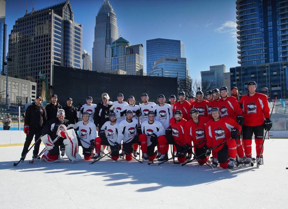 The Charlotte Checkers pose for a picture at Truist Field on Dec. 12, 2022 after the team’s first outdoor practice. Zac Harvey/Photo courtesy of the Charlotte Checkers