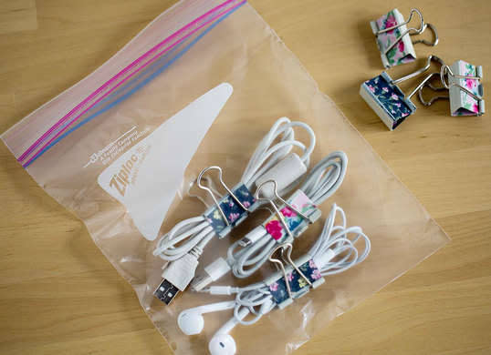 <p>Today’s wired world requires a seemingly infinite number and variety of chargers, plugs, and accessories. Keep all those cords neat and organized by coiling them carefully and securing them with binder clips or twist ties. Place them in a ziplock bag along with any related plugs or chargers, <a href="http://www.bobvila.com/slideshow/8-clever-ways-to-use-post-it-notes-49133" rel="nofollow noopener" target="_blank" data-ylk="slk:label;elm:context_link;itc:0;sec:content-canvas" class="link ">label</a> the outside with a permanent marker—"extra cell phone charger,“ "USB connectors,” and so on—and you’ll never be at a loss for the proper plug-in again. <i>Photo: <a href="http://ziploc.com/en/inspiration/home-and-decor/tips-and-tricks/big%20ideas%20for%20a%20tiny%20dorm%20room" rel="nofollow noopener" target="_blank" data-ylk="slk:ziploc.com;elm:context_link;itc:0;sec:content-canvas" class="link ">ziploc.com</a><br></i><b>RELATED: <a href="http://www.bobvila.com/slideshow/top-10-clutter-hot-spots-and-quick-tips-for-tackling-them-44599" rel="nofollow noopener" target="_blank" data-ylk="slk:Top 10 Clutter Hot Spots—and Quick Tips for Tackling Them;elm:context_link;itc:0;sec:content-canvas" class="link ">Top 10 Clutter Hot Spots—and Quick Tips for Tackling Them</a></b></p>