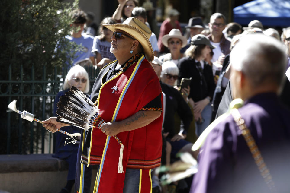 A Native American dancer participates in a powwow in honor of Indigenous Peoples Day in Santa Fe, N.M., Monday Oct. 9, 2023. The state of New Mexico, home to 23 federally recognized Native American communities, replaced Columbus Day with Indigenous Peoples Day through legislation in 2019. A new powwow was launched this year in Santa Fe, where dance groups converged from across New Mexico and beyond. (AP Photo/Morgan Lee)