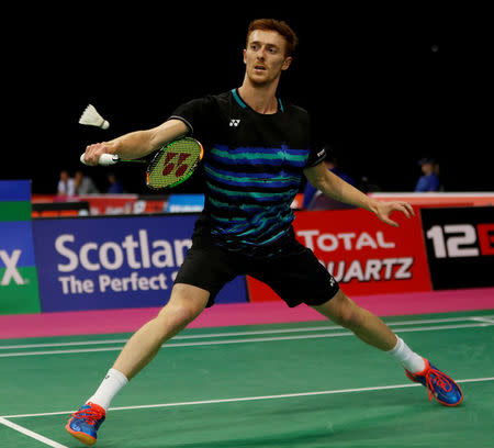 Badminton - Badminton World Championships - Glasgow, Britain - August 21, 2017 Scotland's Kieran Merrilees in action against China's Lin Dan REUTERS/Russell Cheyne