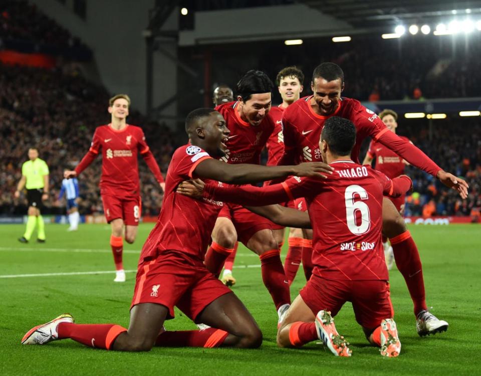 The Reds celebrate their emphatic win  (Liverpool FC via Getty Images)