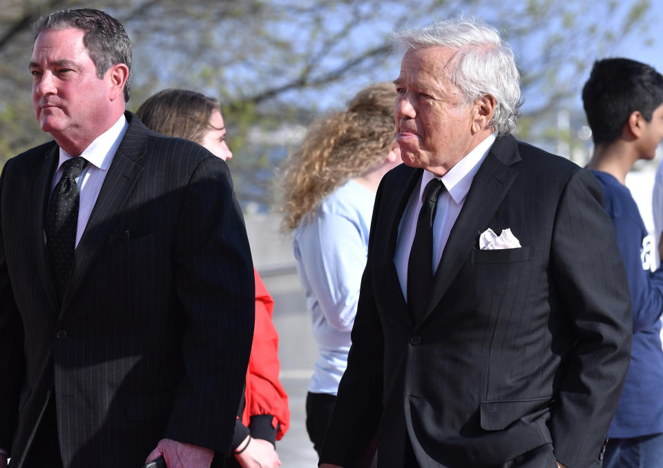 New England Patriot's owner Robert Kraft, right, arrives for a ceremony where, Speaker of the House Nancy Pelosi, D-Calif., receives the 2019 John F. Kennedy Profile in Courage Award during ceremonies at the John F. Kennedy Presidential Library and Museum, Sunday, May 19, 2019, in Boston. (AP Photo/Josh Reynolds)
