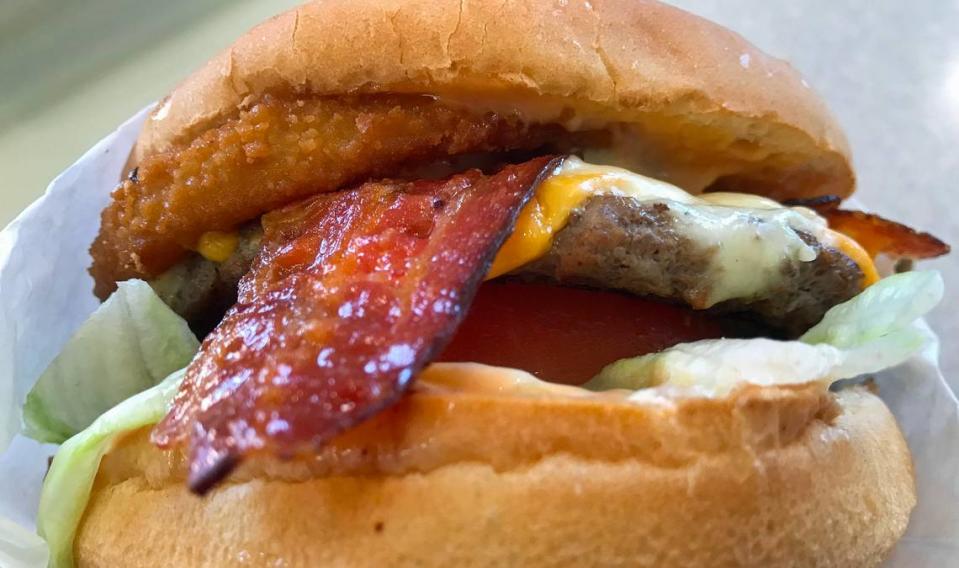 The Big Boss Burger at Fosters Freeze in Morro Bay is a well-stuffed, juicy, two-hander entree with a beef patty, American and Swiss cheeses and bacon.