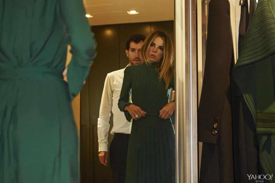 Erica Pelosini tries on a green Ferragamo outfit.