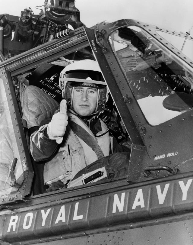 Picture taken on October 10, 1972 showing Prince Charles of Wales on board a Royal Navy's helicopter. (Photo by - / CENTRAL PRESS PHOTO LTD / AFP)        (Photo credit should read -/AFP via Getty Images)