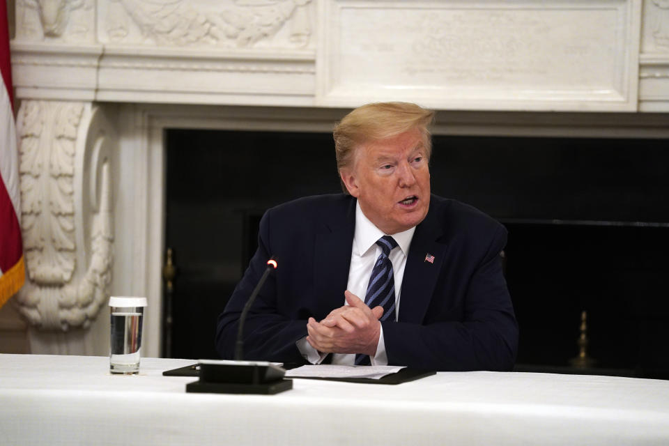 President Donald Trump speaks during a meeting with Republican lawmakers, in the State Dining Room of the White House, Friday, May 8, 2020, in Washington. (AP Photo/Evan Vucci)