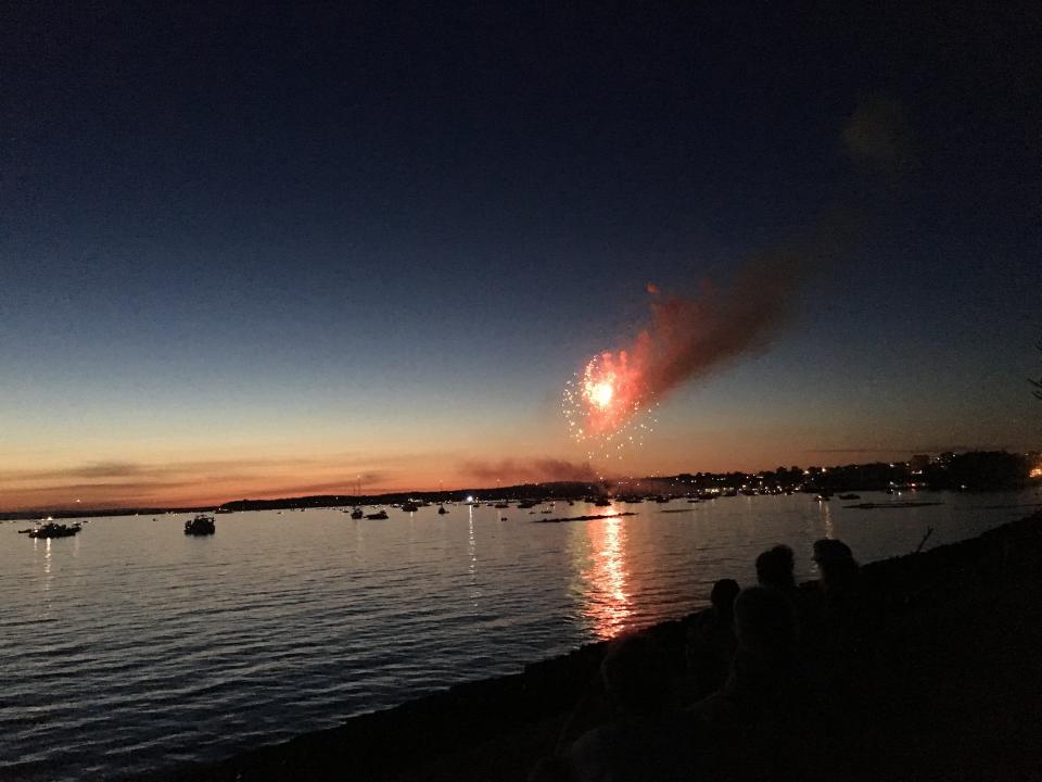 Fireworks over Burlington Bay, as seen from the bikepath on July 3, 2018.