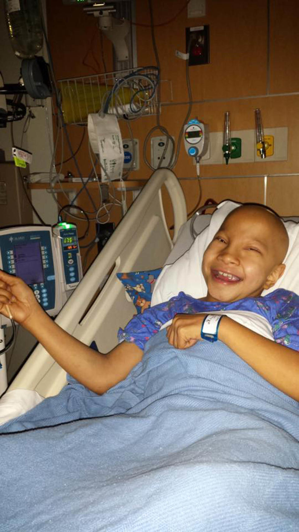 "This is Keano Clark at age 11. He had non-Hodgkin lymphoma, specifically diffuse large B-cell lymphoma. He received nine spinal taps, two blood transfusions and a total of 39 days of chemotherapy. <strong>He always has a smile on his face regardless of his pain.</strong>" -- Kathy Wilson