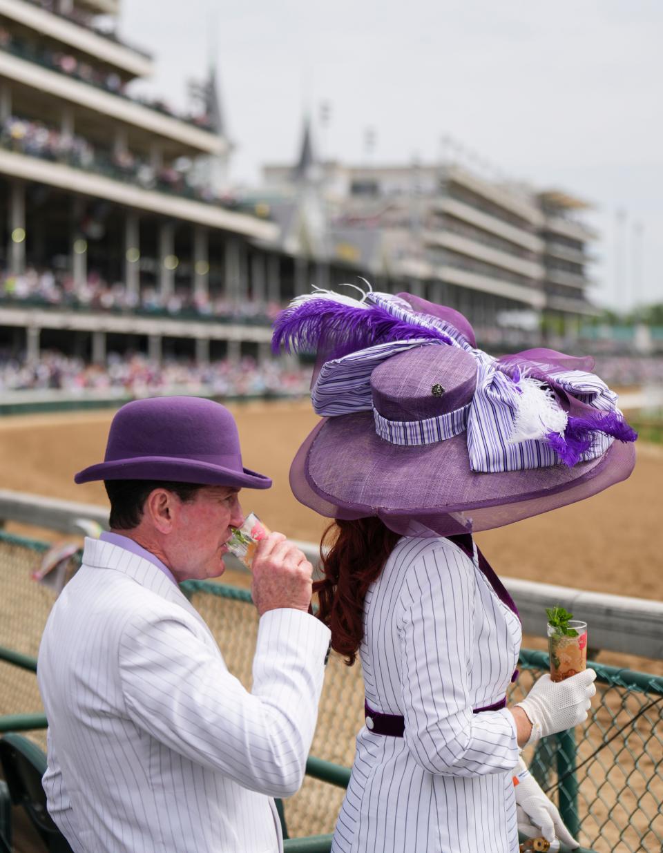 Louisvillians Carrie and Jeff Ketterman attend the Kentucky Derby Saturday at Churchill Downs in Louisville, Ky. It was Carrie's 25th, and she designs her own hats which she sells to help pay for Derby tickets for her and Jeff. May, 6, 2023.