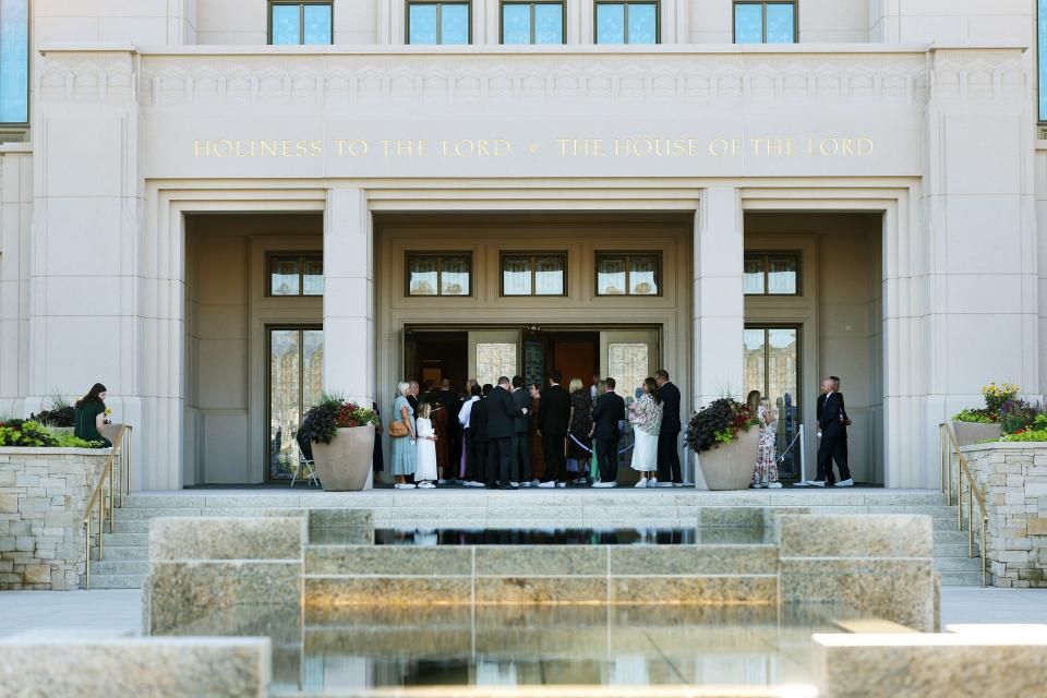 Latter-day Saints enter the the Saratoga Springs Utah Temple to attend a dedicatory session on Sunday, Aug. 13, 2023, in Saratoga Springs, Utah. | Scott G Winterton, Deseret News