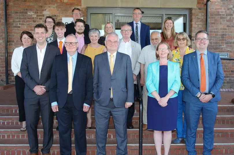 Gloucester City Council's Liberal Democrat group outside North Warehouse