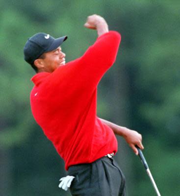 Tiger Woods' signature fist-pump was seen by many golf fans for the first time when he became the youngest player to win the Masters, and broke the course record, in 1997.