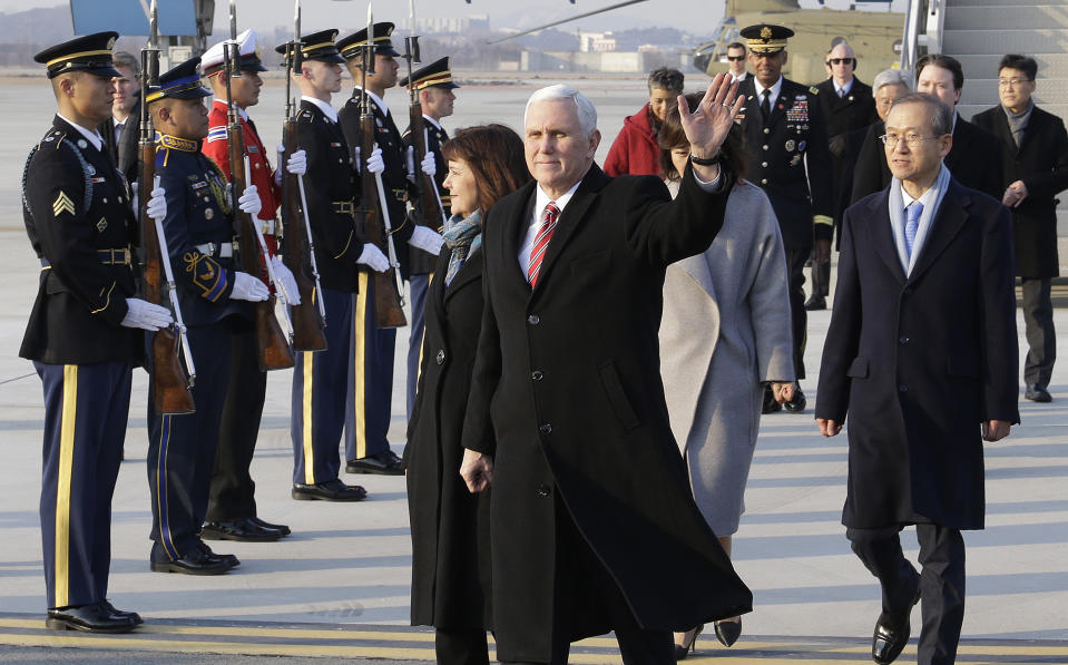 Mike Pence waves upon his arrival at Osan Air Base in Pyeongtaek, South Korea on Thursday. (AP)