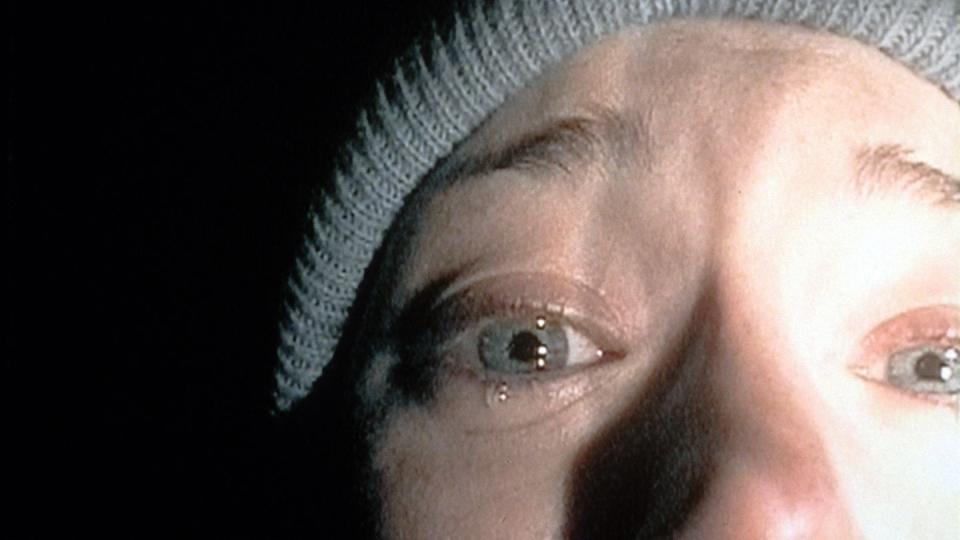 a close up of a crying heather from the blair witch project, a good housekeeping pick for best halloween movies