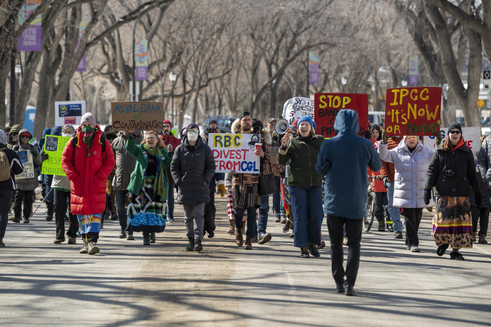 Marchers during a protest against the RBC’s Annual General Meeting at the Delta Bessborough hotel in Saskatoon, Sask., Wednesday, April 5, 2023. (THE CANADIAN PRESS/Liam Richards)