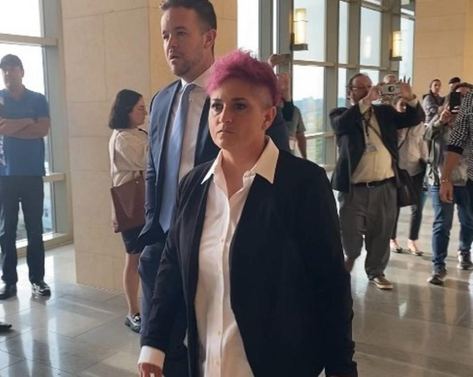 Bitwise co-founders Jake Soberal and Irma Olguin Jr. walk out of the Robert E. Coyle Federal Courthouse in Fresno following their first court appearance on Nov. 9, 2023, on criminal allegations of wire fraud.