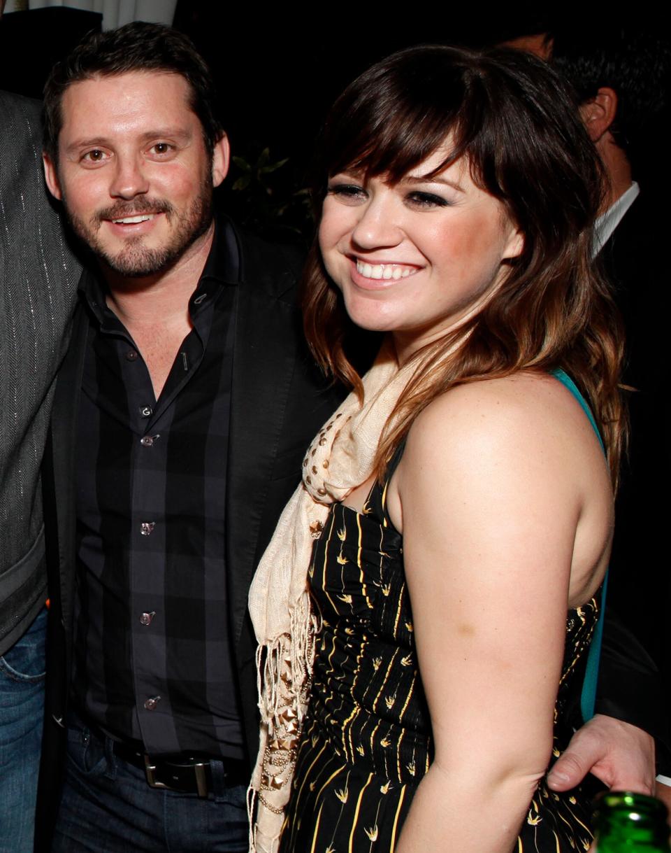 Brandon Blackstock and Kelly Clarkson attend Warner Music Group Grammy Celebration hosted by InStyle at Chateau Marmont on February 12, 2012 in Los Angeles, California