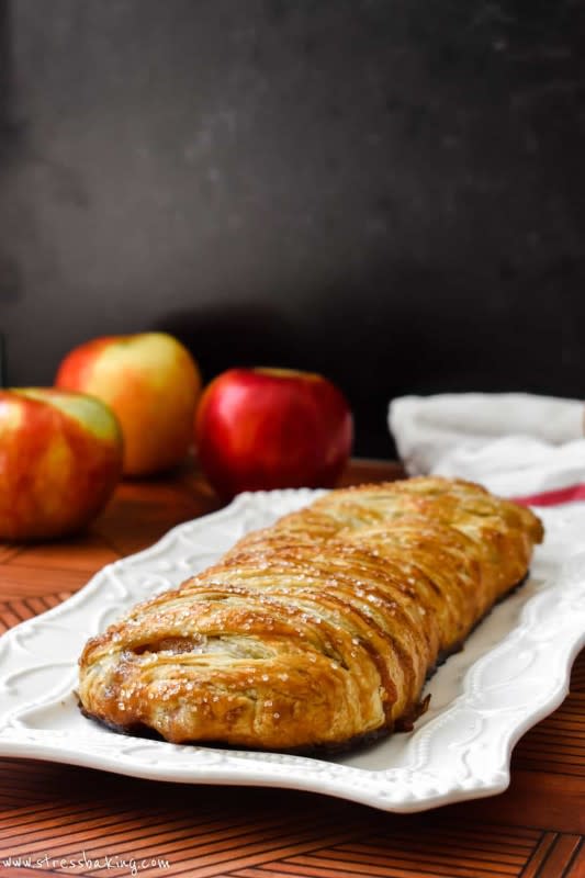 <p>Stress Baking</p><p>This apple strudel is made easy with pre-made frozen puff pastry! A crisp, golden crust filled with sweet cinnamon sugar, tart apples and optional sliced almonds and golden raisins. </p><p><strong>Get the recipe: <em><a href="https://stressbaking.com/apple-strudel/" rel="nofollow noopener" target="_blank" data-ylk="slk:Apple Strudel;elm:context_link;itc:0;sec:content-canvas" class="link ">Apple Strudel</a></em></strong></p>