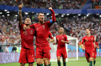<p>Ronaldo joins in the celebrations as Portugal go in ahead </p>