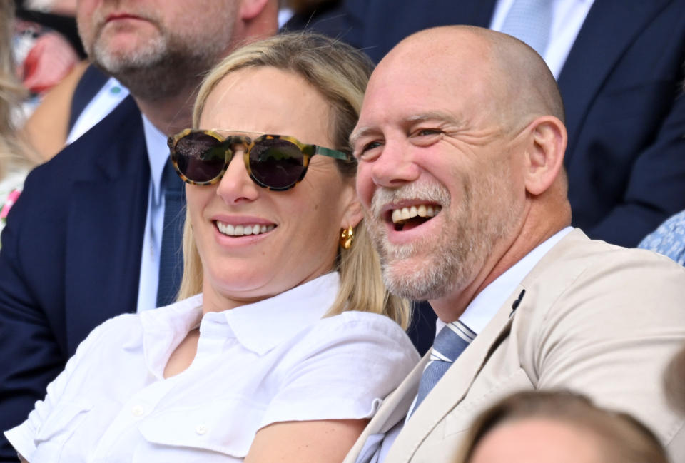 LONDON, ENGLAND - JUNE 28:  Zara Phillips and Mike Tindall laugh as they attend Day Two of Wimbledon 2022 at the All England Lawn Tennis and Croquet Club on June 28, 2022 in London, England. (Photo by Karwai Tang/WireImage)