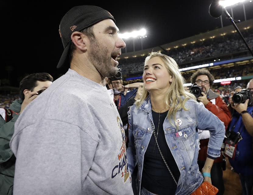 Justin Verlander and Kate Upton celebrate the Houston Astros World Series championship at Dodger Stadium before traveling to Italy for their wedding three days later. (AP)