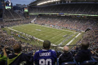 Fans at Lumen Field watch the first half of an NFL preseason football game between the Seattle Seahawks and the Denver Broncos, Saturday, Aug. 21, 2021, in Seattle. (AP Photo/Stephen Brashear)