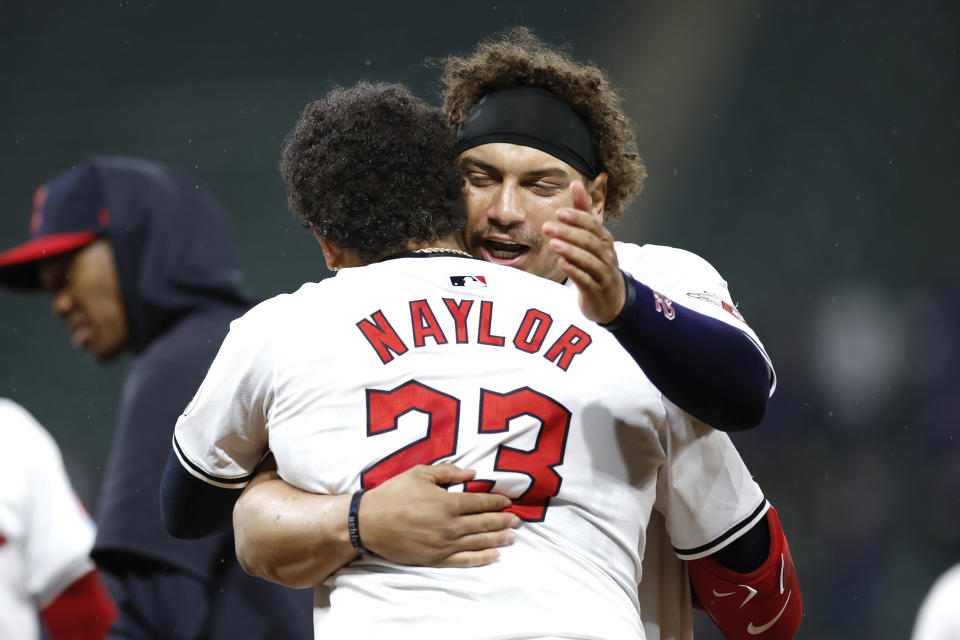 Cleveland Guardians' Bo Naylor (23) celebrates his game winning RBI single off Chicago White Sox pitcher Bryan Shaw with Josh Naylor in a baseball game, Wednesday, April 10, 2024, in Cleveland. (AP Photo/Ron Schwane)