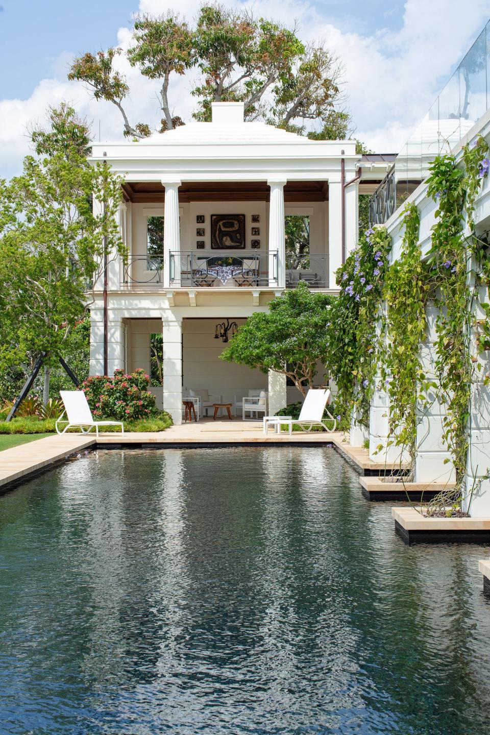On the northwest corner of 726 Hi Mount Road in Palm Beach, a two-story open-air pavilion offers space for dining on the upper level and a lounge area for the main pool on the lower level. The house was recognized for excellence in new architecture at an April 12 ceremony at the Preservation Foundation of Palm Beach.