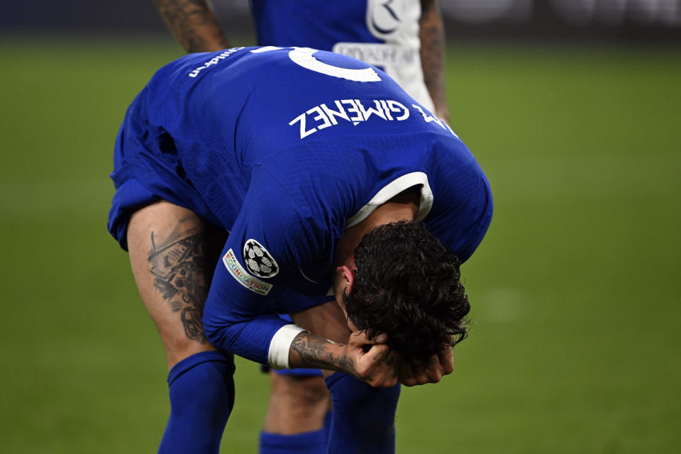 Atletico's Jose Gimenez reacts after a Champions League quarterfinal second leg soccer match between Borussia Dortmund and Atletico Madrid at the Signal-Iduna Park in Dortmund, Germany, Tuesday, April 16, 2024. (Bernd Thissen/dpa via AP)