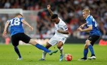 Football - England v Estonia - UEFA Euro 2016 Qualifying Group E - Wembley Stadium, London, England - 9/10/15 England's Raheem Sterling in action with Estonia's Taijo Teniste and Karol Mets Action Images via Reuters / Carl Recine