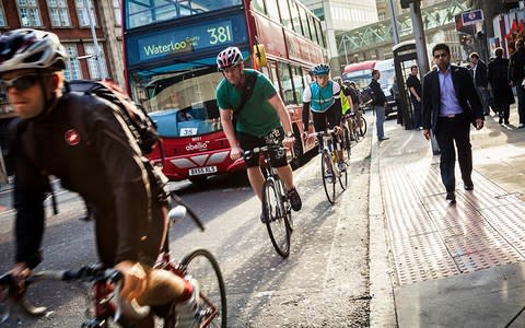 Cyclists compete for space in London - Credit: Getty