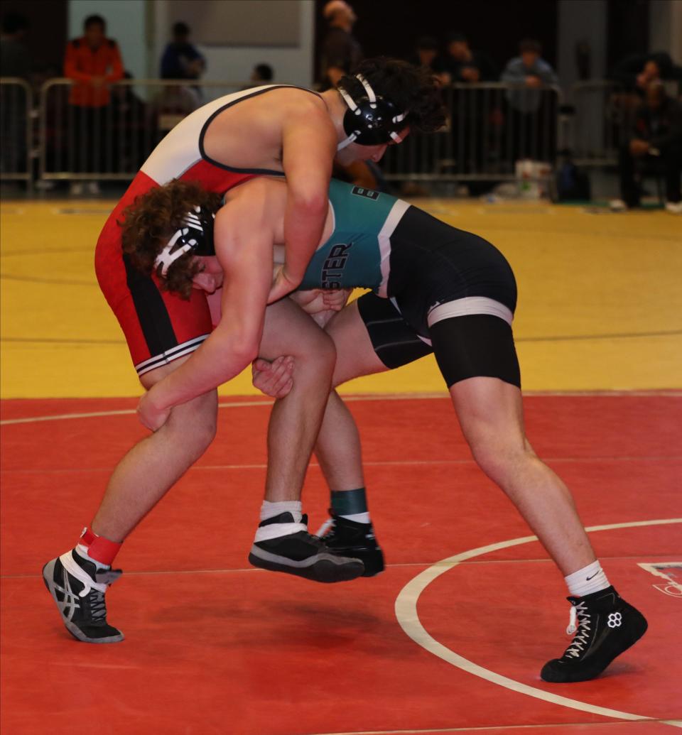 Ryan Brace from Brewster wrestles Cameron Keeperman from Tappan Zee in the 215 pound match, during the first day of the Section One Division I championships at the Westchester County Center in White Plains, Feb. 10, 2024.