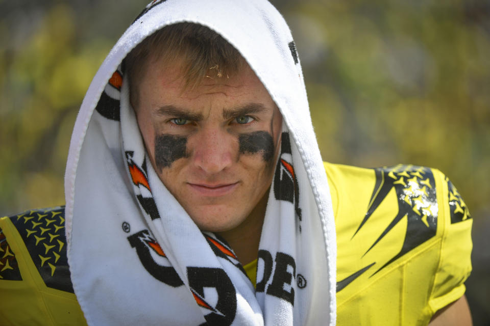 Oregon quarterback Bo Nix walks the sideline as his team plays Portland State during the second half of an NCAA college football game Saturday, Sept. 2, 2023, in Eugene, Ore. (AP Photo/Andy Nelson)