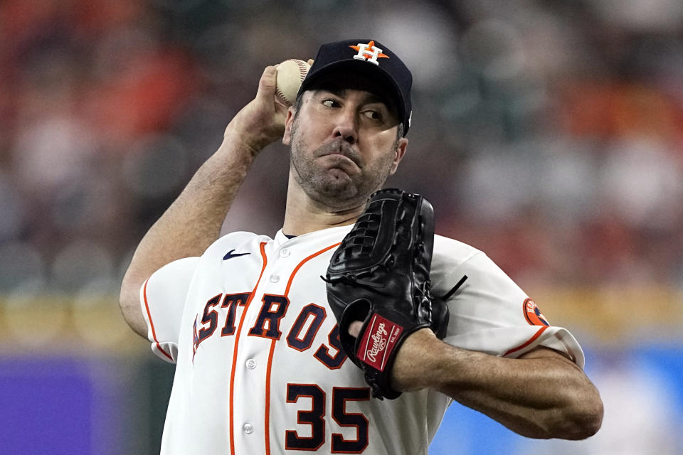 Houston Astros starting pitcher Justin Verlander throws against the Minnesota Twins during the first inning of a baseball game Tuesday, Aug. 23, 2022, in Houston. (AP Photo/David J. Phillip)