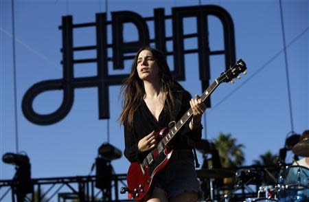 Danielle Haim of rock band Haim performs at the Coachella Music Festival in Indio, California April 11, 2014. A slew of rising artists and bands kicked off the annual Coachella Valley Music and Arts Festival on Friday, ahead of the much anticipated reunion of hip-hop duo Outkast headlining the first night of the three-day festival. REUTERS/Mario Anzuoni