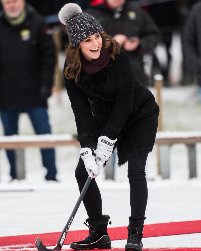 Pom-pom pomp… Catherine, Duchess of Cambridge hits a hockeyball on a royal visit to Sweden and Norway in 2018.