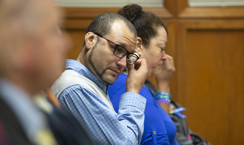 The murdered boy’s father, Carlo Brewer, wipes away tears during a court hearing in October in which Bodine was convicted (Picture: AP)